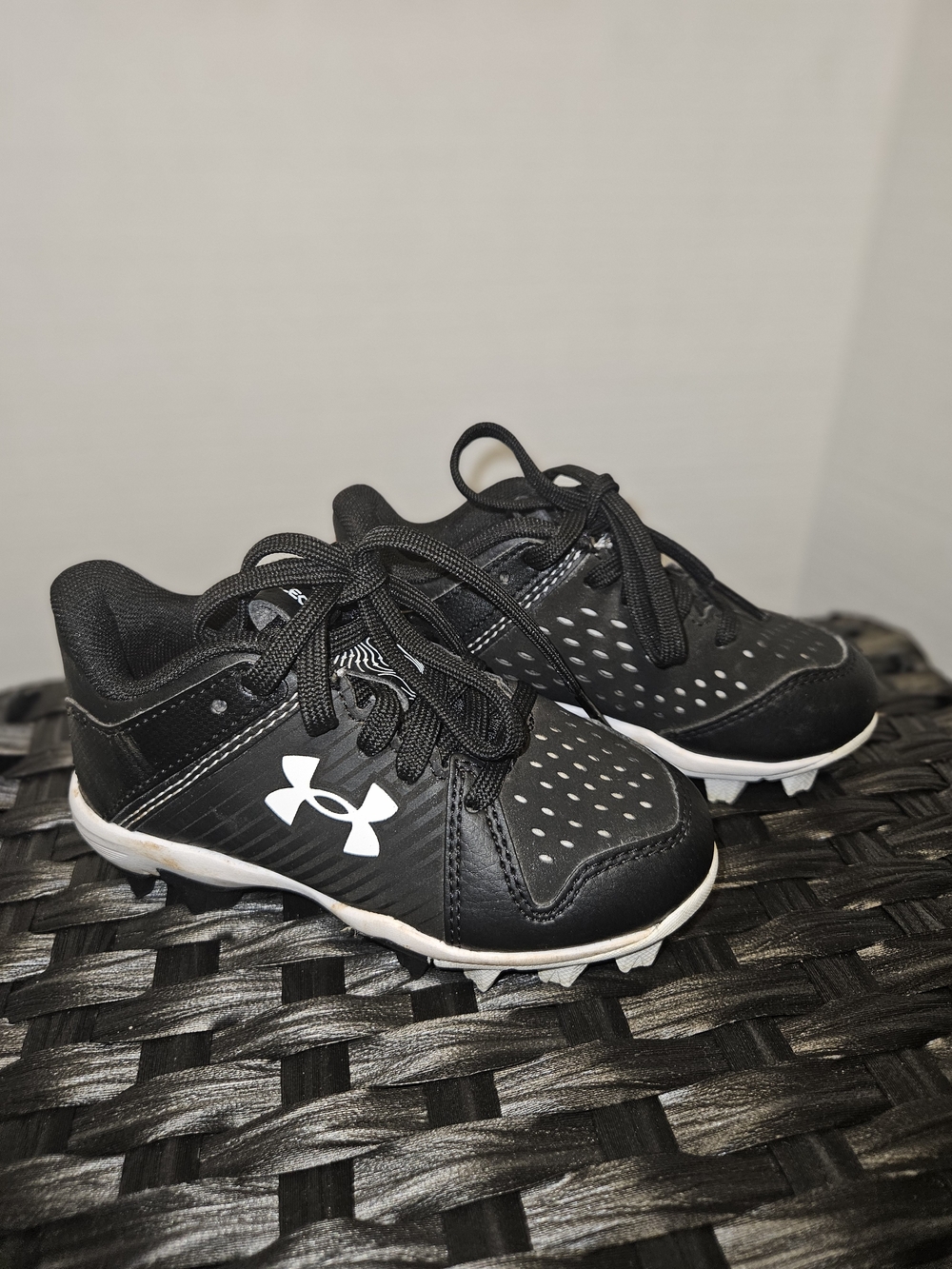 Under Armour Kids Black and White Cleats with Logo